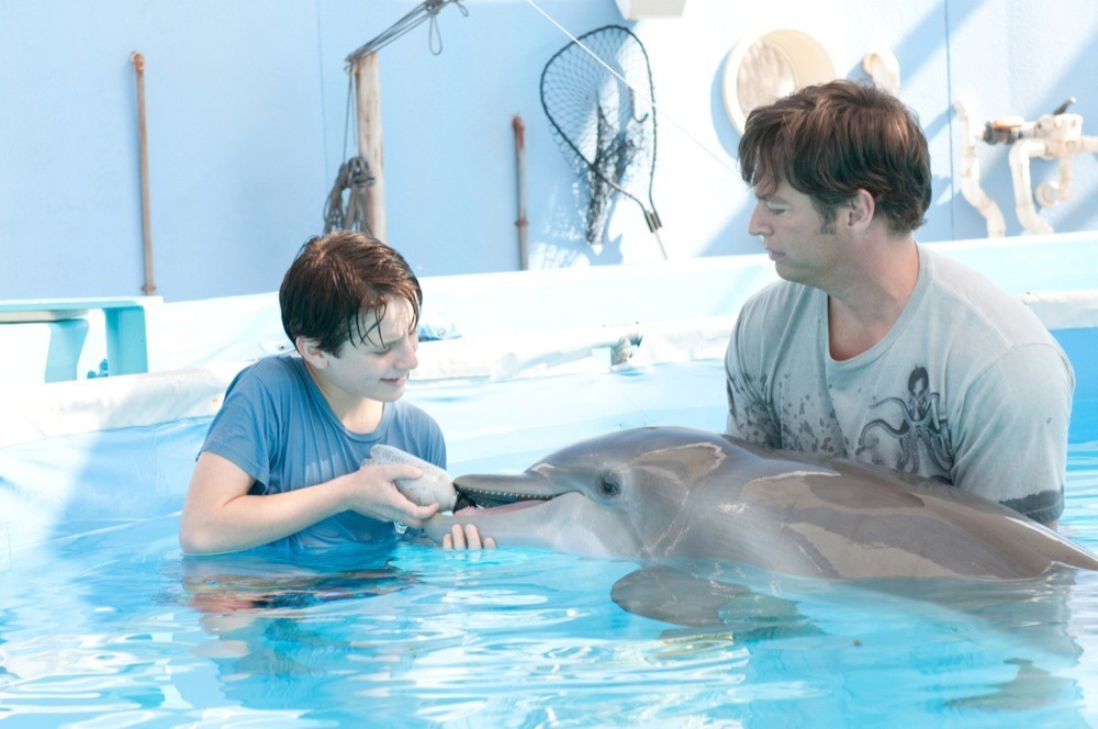Nathan Gamble stars as Sawyer Nelson and Harry Connick Jr. stars as Dr. Clay Haskett in Warner Bros. Pictures' Dolphin Tale (2011)
