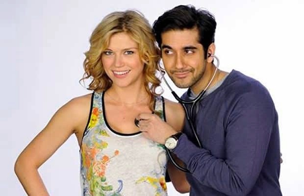 Adrianne Palicki and Vinay Virmani (stars as Deepak) in Entertainment One Films' Dr. Cabbie (2014)