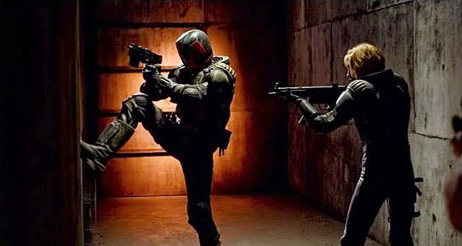 Karl Urban stars as Judge Dredd and Olivia Thirlby stars as Cassandra Anderson in Lionsgate Films' Dredd (2012)