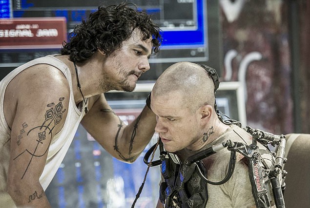 Wagner Moura and Matt Damon (stars as Max) in TriStar Pictures' Elysium (2013)