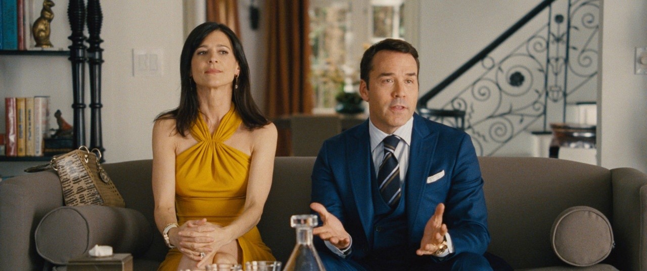 Constance Zimmer stars as Dana Gordon and Jeremy Piven stars as Ari Gold in Warner Bros. Pictures' Entourage (2015)