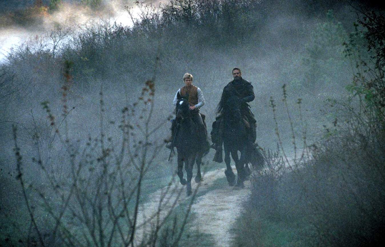 Edward Speleers as Eragon and Jeremy Irons as Brom in The 20th Century Fox' Eragon (2006)