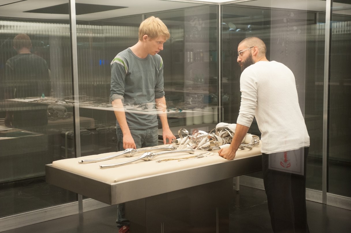 Domhnall Gleeson stars as Caleb and Oscar Isaac stars as Nathan in A24's Ex Machina (2015)