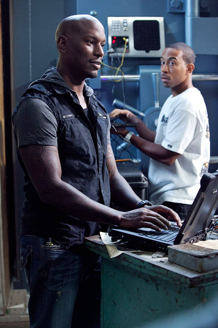 Tyrese Gibson stars as Roman Pearce and Ludacris stars as Tej in Universal Pictures' Fast Five (2011)