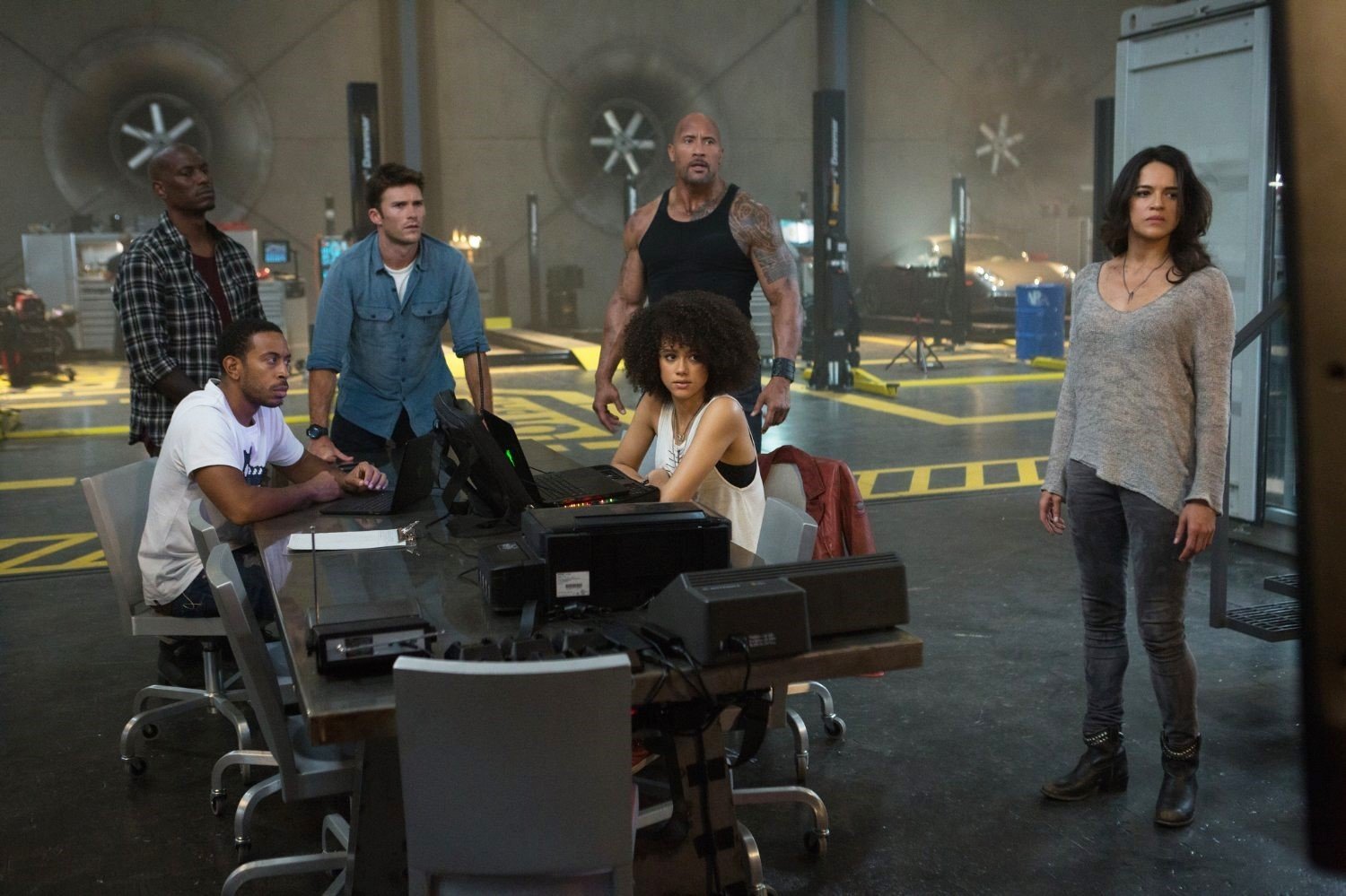 Tyrese Gibson, Ludacris, Scott Eastwood, The Rock, Nathalie Emmanuel and Michelle Rodriguez in Universal Pictures' The Fate of the Furious (2017)