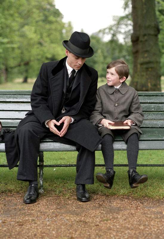 Johnny Depp and Freddie Highmore in Miramax Films' Finding Neverland (2004)