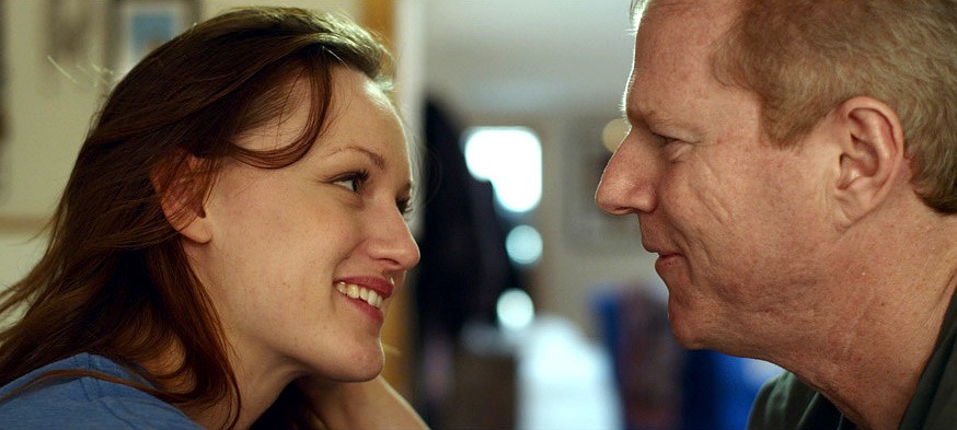 Heather Burns stars as Erin and Noah Emmerich stars as FX in Tribeca Film's The Fitzgerald Family Christmas (2012)