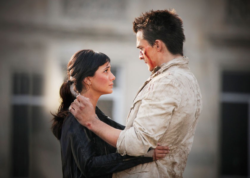 Emmanuelle Chriqui stars as Tatia and Rupert Friend stars as Thomas Anders in Anchor Bay Films' 5 Days of War (2011)