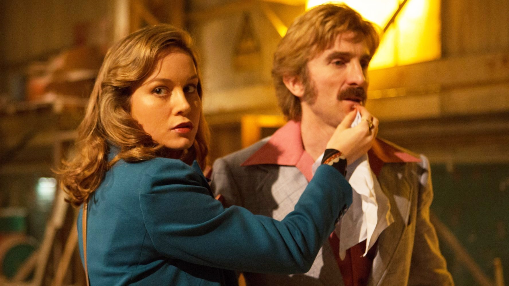 Brie Larson stars as Justine and Sharlto Copley stars as Vernon in A24's Free Fire (2017)