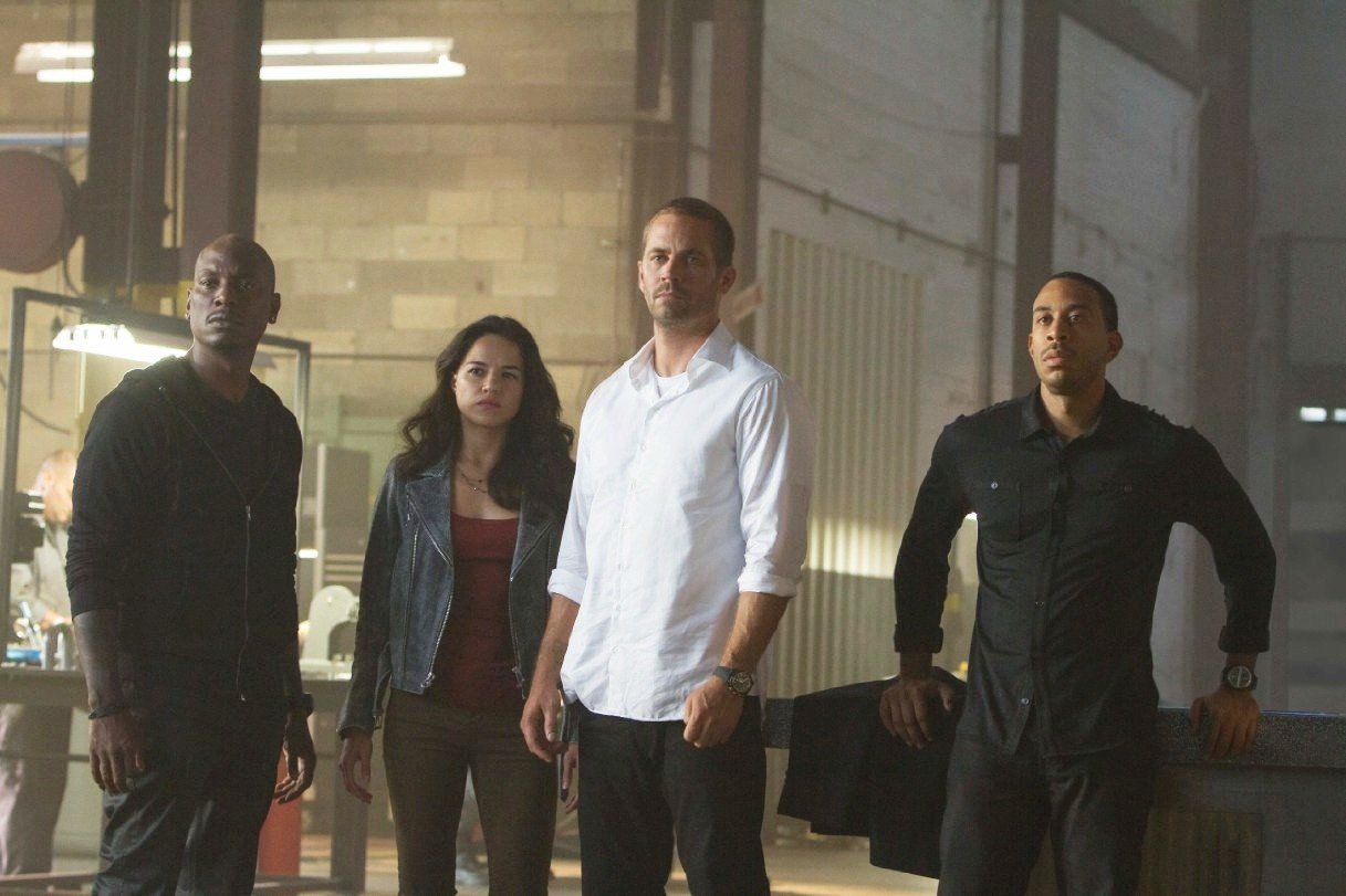 Tyrese Gibson, Michelle Rodriguez, Paul Walker and Ludacris in Universal Pictures' Furious 7 (2015)