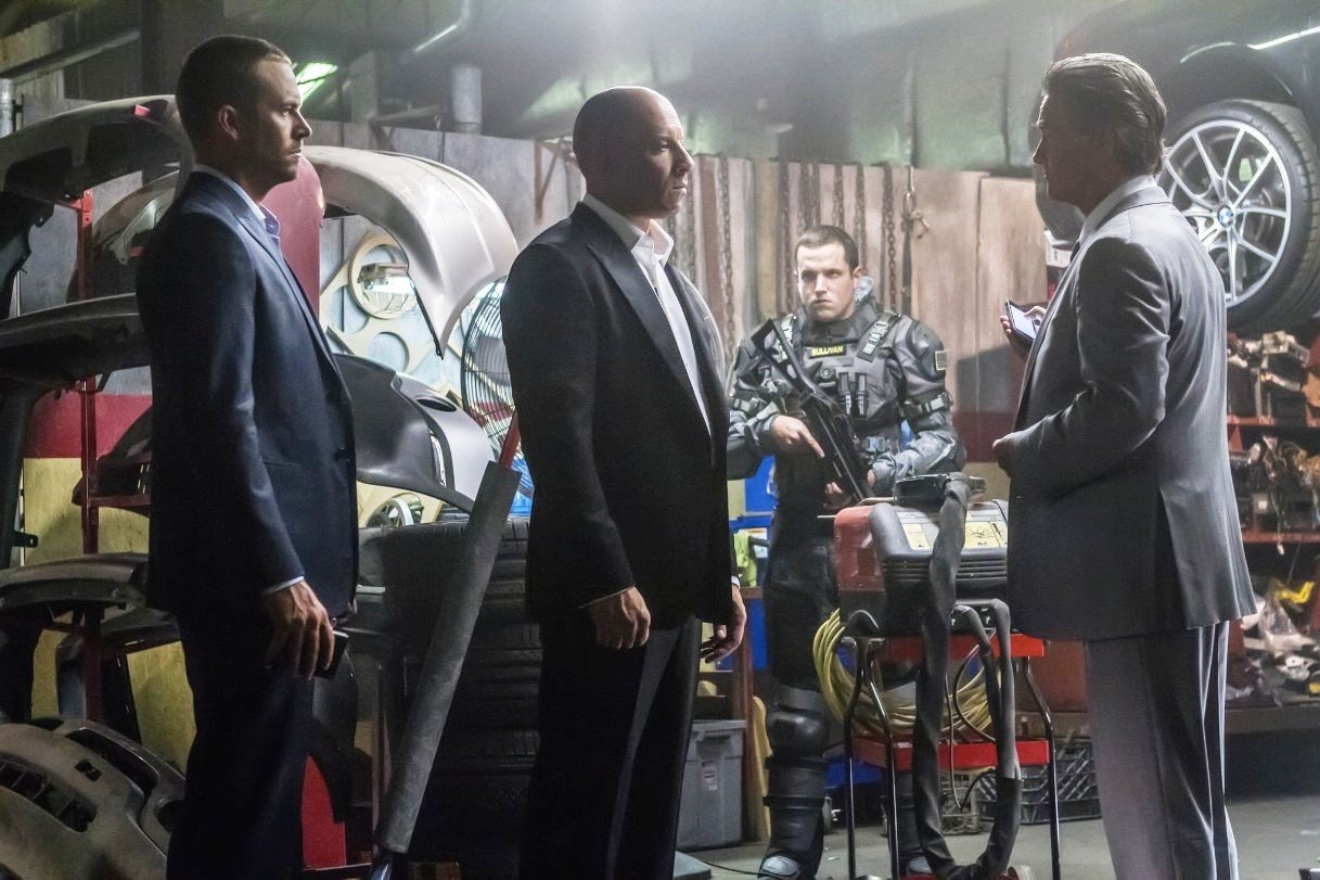 Paul Walker, Vin Diesel and Kurt Russell in Universal Pictures' Furious 7 (2015). Photo credit by Scott Garfield.