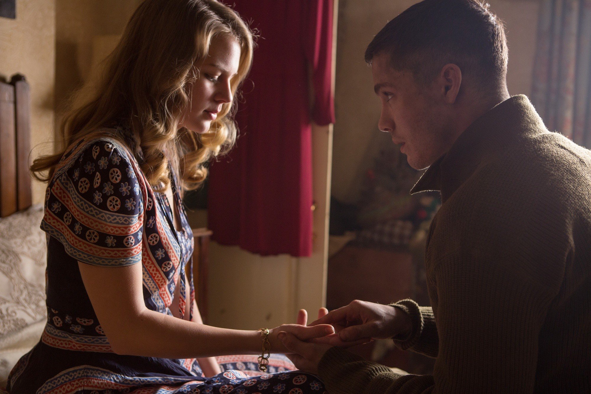 Alicia von Rittberg stars as Emma and Logan Lerman stars as Norman Ellison in Columbia Pictures' Fury (2014)