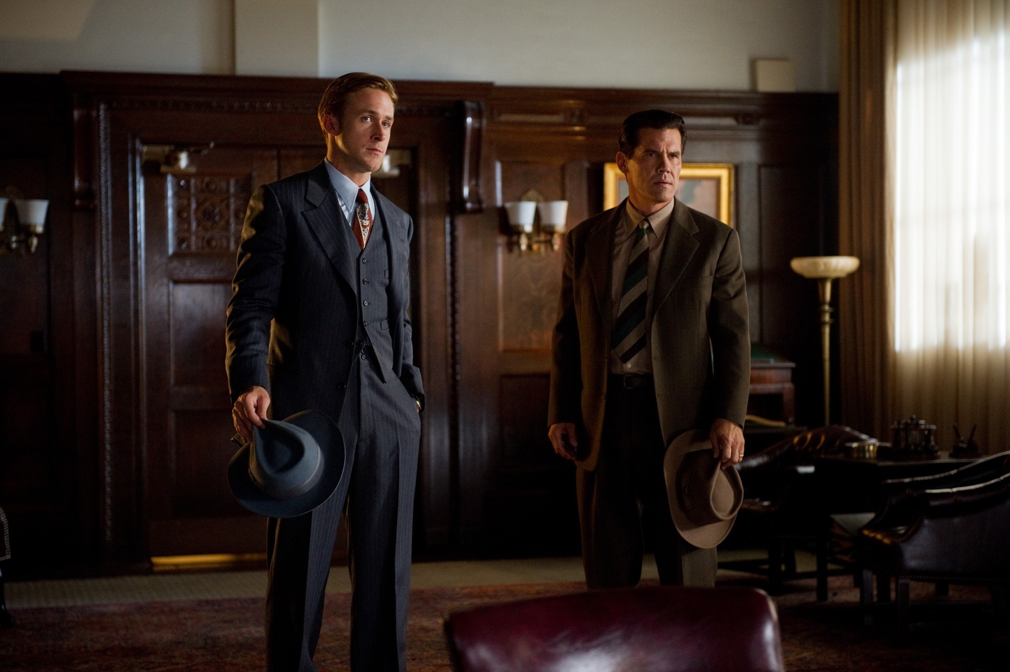 Ryan Gosling stars as Sgt. Jerry Wooters and Josh Brolin stars as John O'Mara in Warner Bros. Pictures' Gangster Squad (2013)