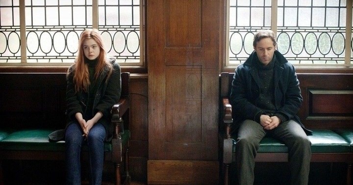 Elle Fanning stars as Ginger and Alessandro Nivola stars as Roland in A24's Ginger and Rosa (2013)
