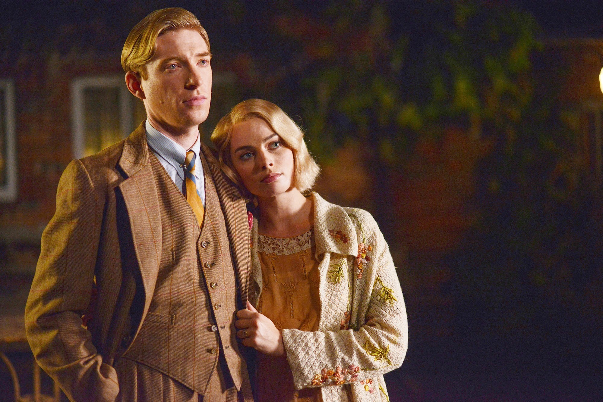 Domhnall Gleeson stars as A.A. Milne and Margot Robbie stars as Daphne Milne in Fox Searchlight Pictures' Goodbye Christopher Robin (2017)