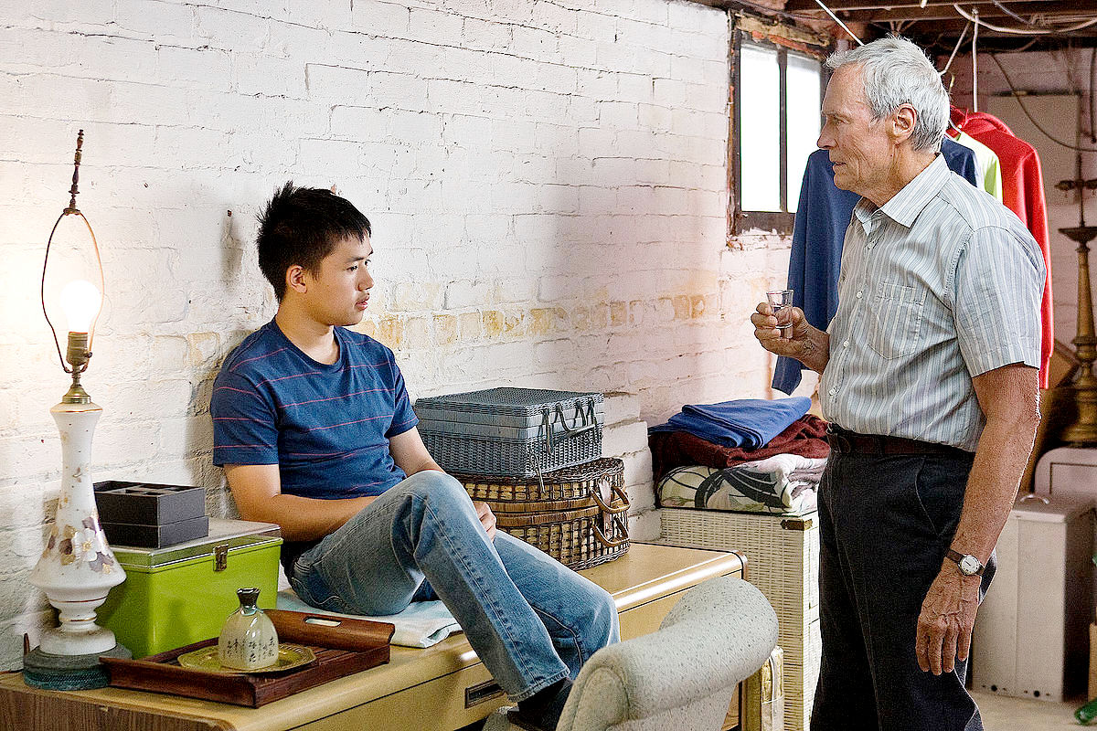 Bee Vang stars as Tao Vang Lor and Clint Eastwood stars as Walt Kowalski in Warner Bros. Pictures' Gran Torino (2008)