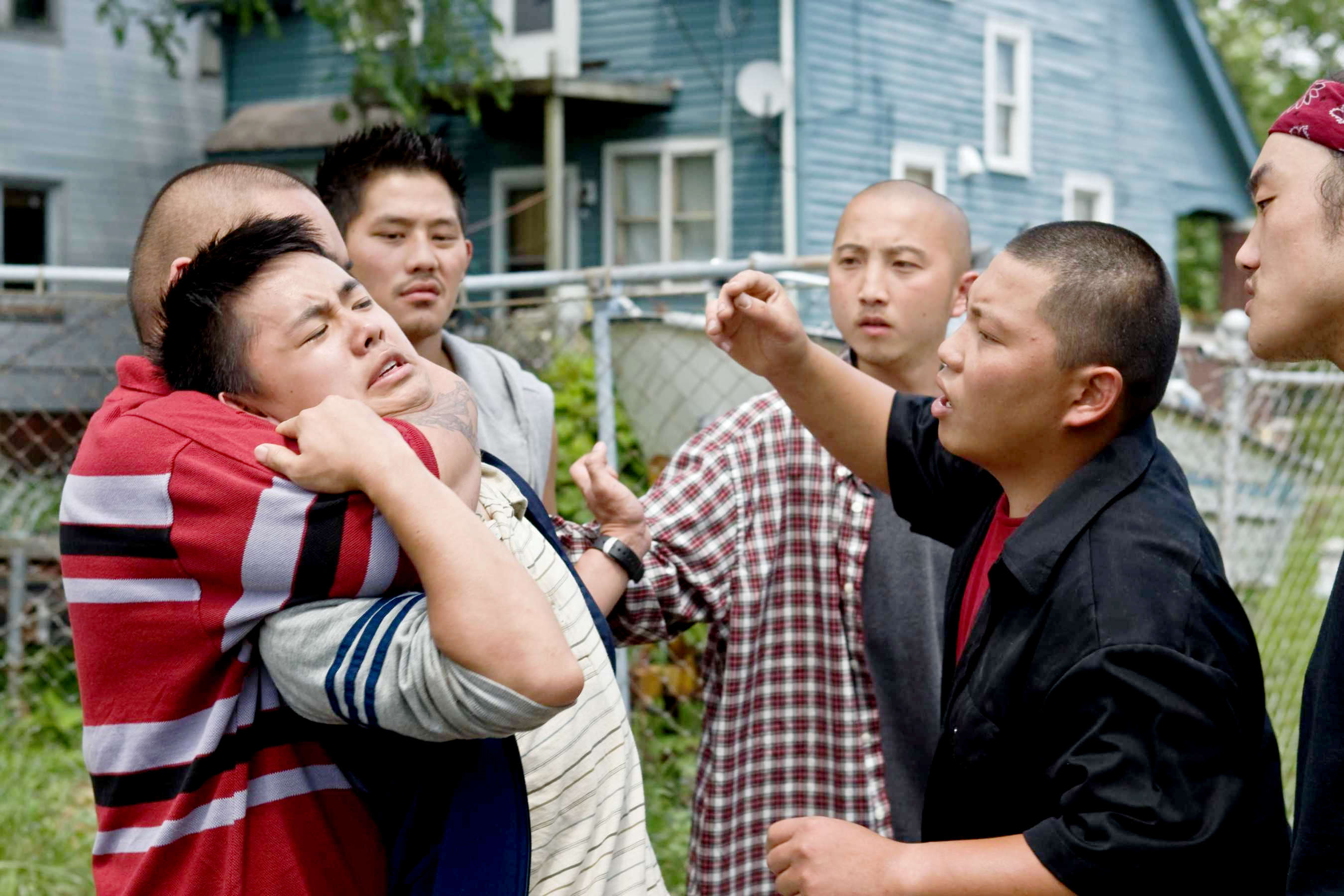 Bee Vang, Jerry Lee, Elvis Thao, Sonny Vue and Doua Moua in Warner Bros. Pictures' Gran Torino (2008). Photo credit by Anthony Michael Rivetti.