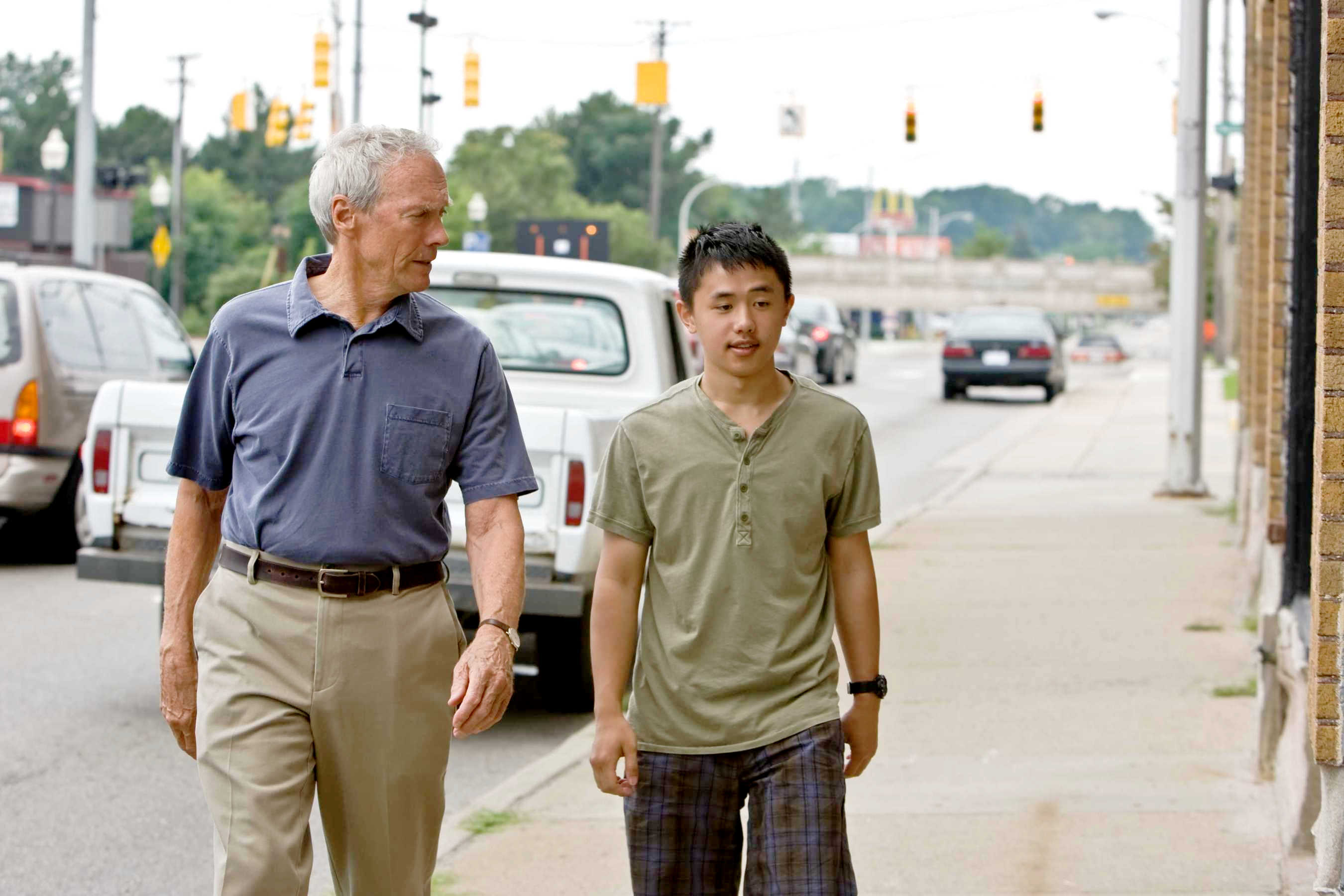 Clint Eastwood stars as Walt Kowalski and Bee Vang stars as Tao Vang Lor in Warner Bros. Pictures' Gran Torino (2008). Photo credit by Anthony Michael Rivetti.