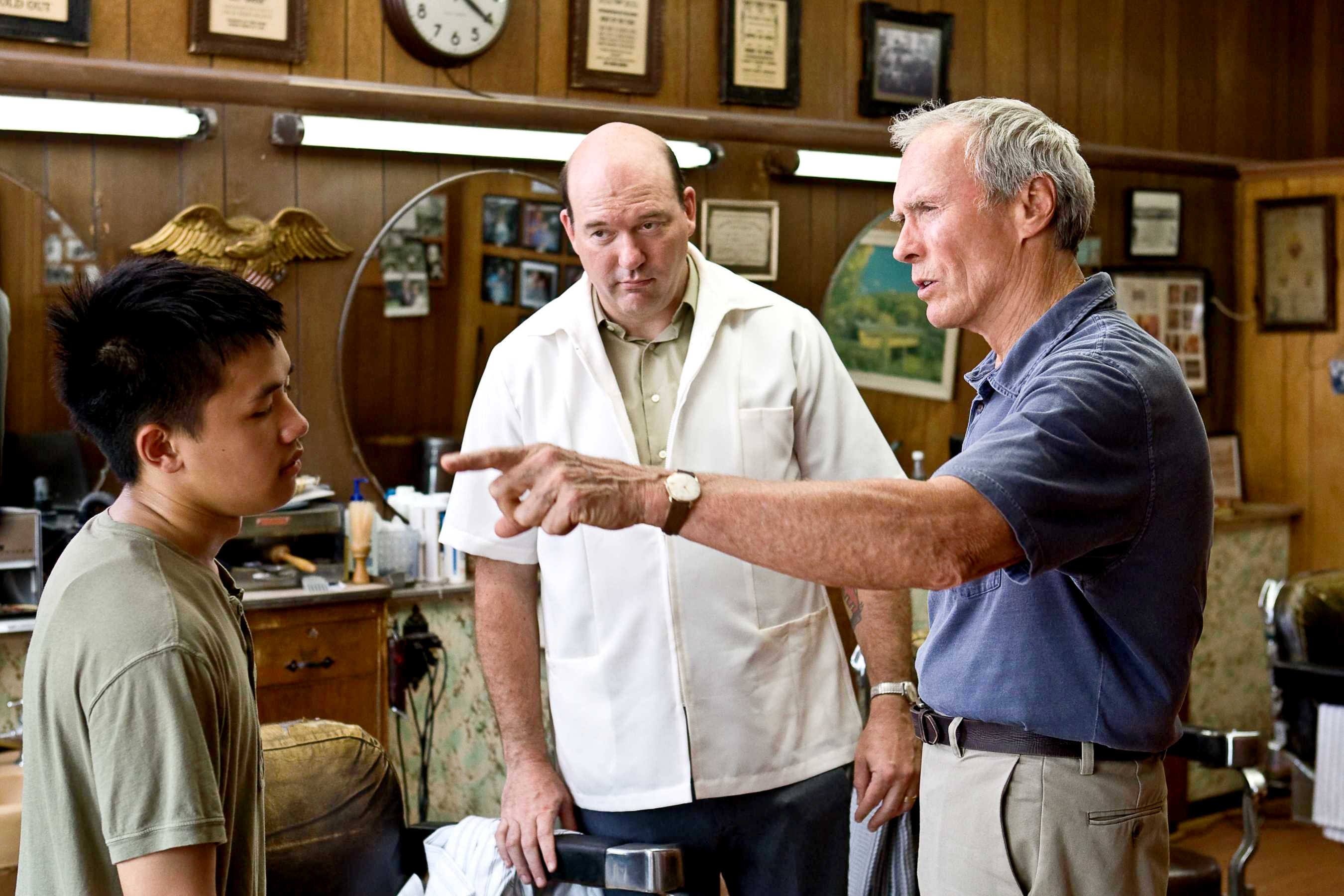 Bee Vang, John Carroll Lynch and Clint Eastwood in Warner Bros. Pictures' Gran Torino (2008). Photo credit by Anthony Michael Rivetti.