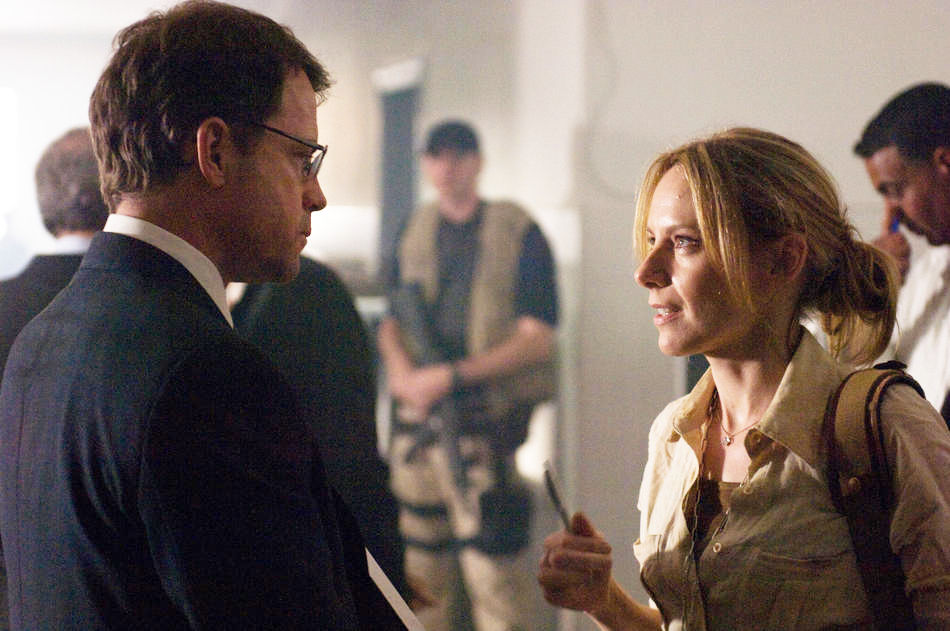 Greg Kinnear stars as Clark Poundstone and Amy Ryan stars as Lawrie Dayne in Universal Pictures' Green Zone (2010)