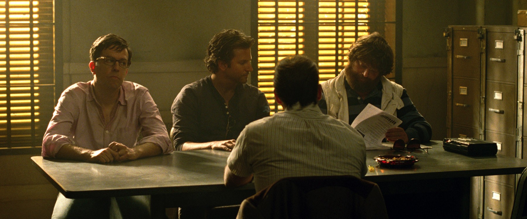Ed Helms, Bradley Cooper and Zach Galifianakis in Warner Bros. Pictures' The Hangover Part III (2013)