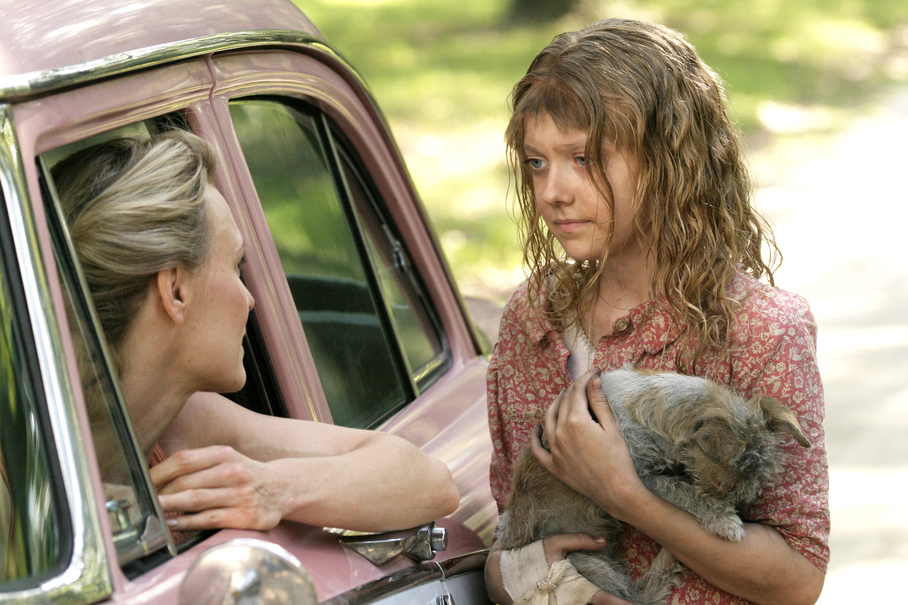 Robin Wright Penn stars as Stranger Lady and Dakota Fanning stars as Lewellen in Empire Film Group's Hounddog (2008)