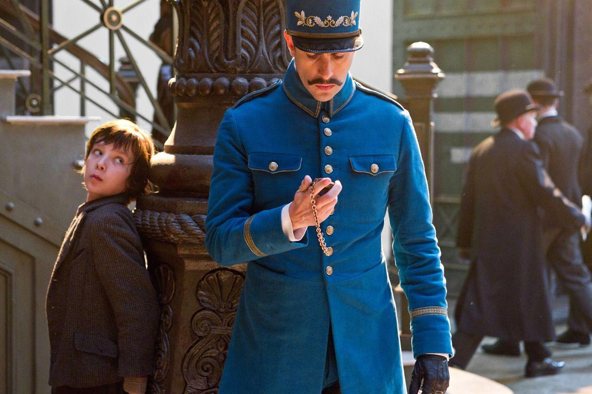 Asa Butterfield stars as Hugo Cabret and 	Sacha Baron Cohen stars as Station Inspector in Paramount Pictures' Hugo (2011)