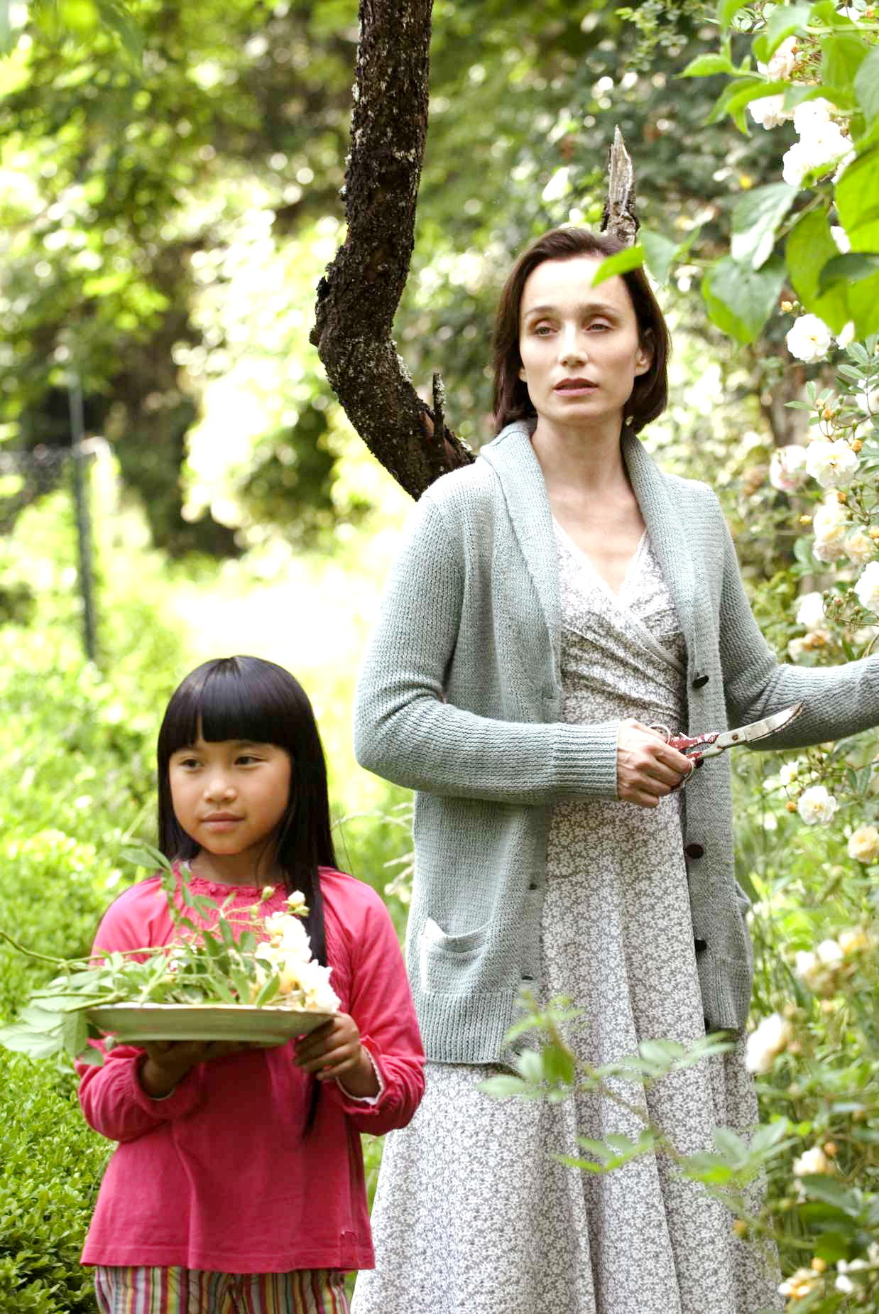 Lise Segur stars as P'tit Lys and Kristin Scott Thomas stars as Juliette Fontaine in Sony Pictures Classics' I've Loved You So Long (2008). Photo credit by Thierry Valletoux.