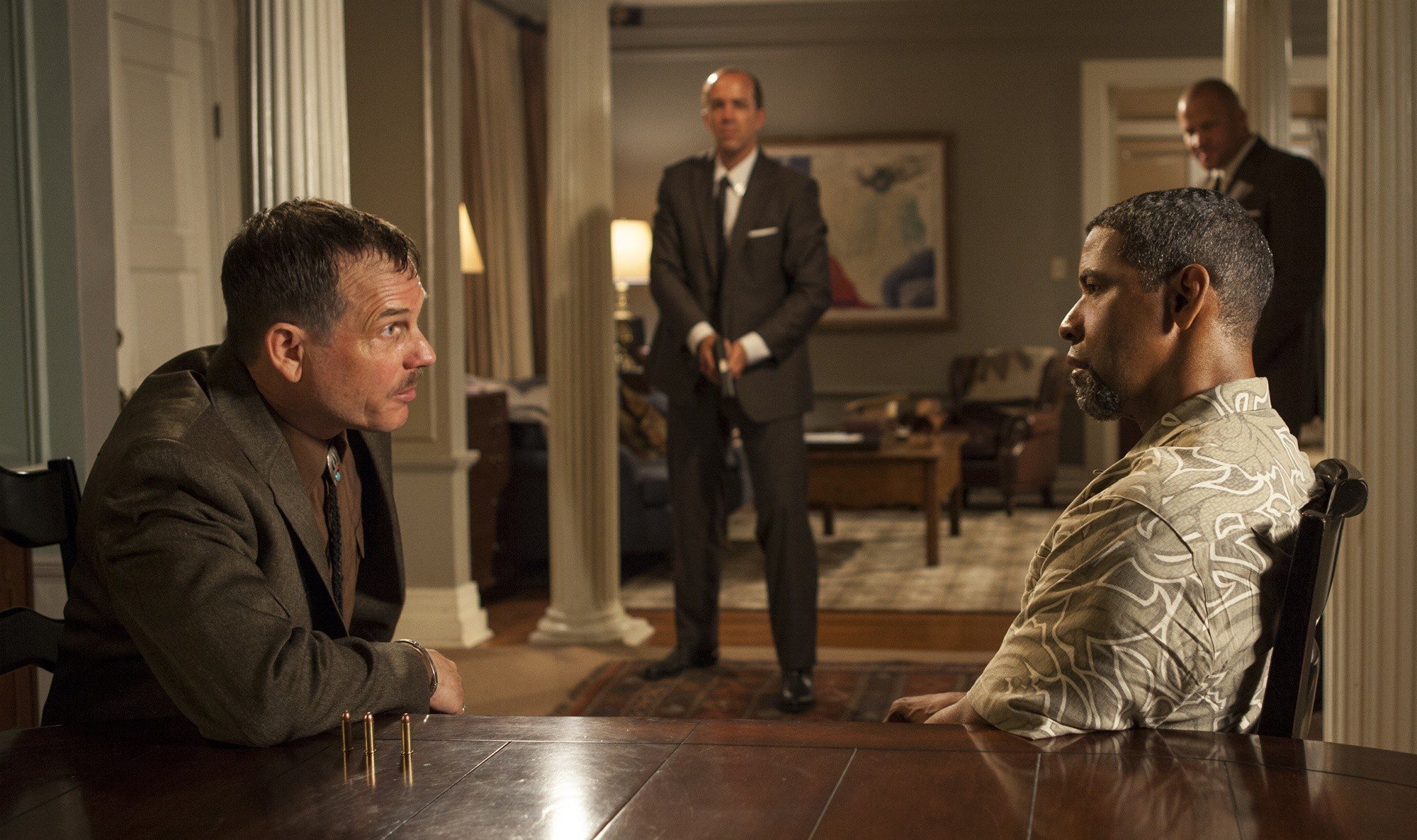 Bill Paxton stars Earl Denzel Washington stars as Robert 'Bobby' Trench in Universal Pictures' 2 Guns (2013)