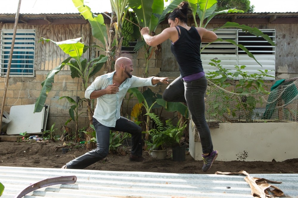 Amaury Nolasco stars as Silvio Lugo and Gina Carano stars as Ava in Anchor Bay Films' In the Blood (2014)