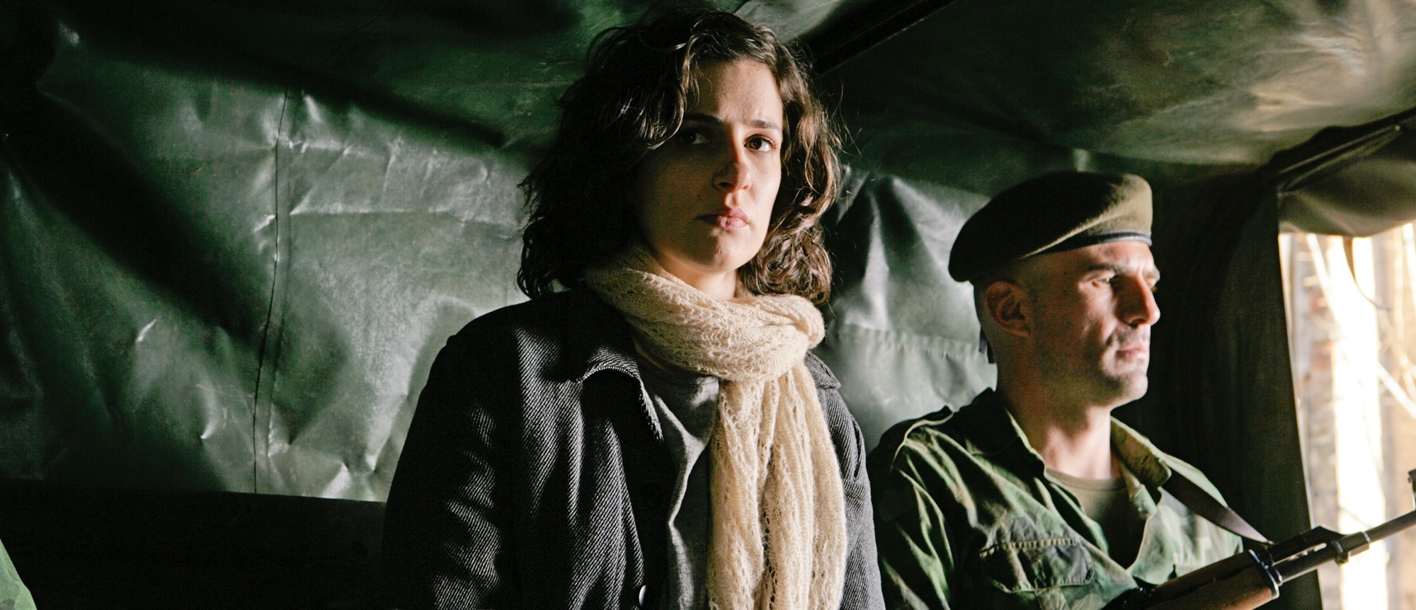 http://www.aceshowbiz.com/images/still/in-the-land-of-blood-honey02.jpg