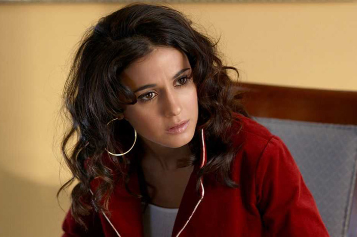 Emmanuelle Chriqui as Dolly Pacelli, the daughter of mob boss in 