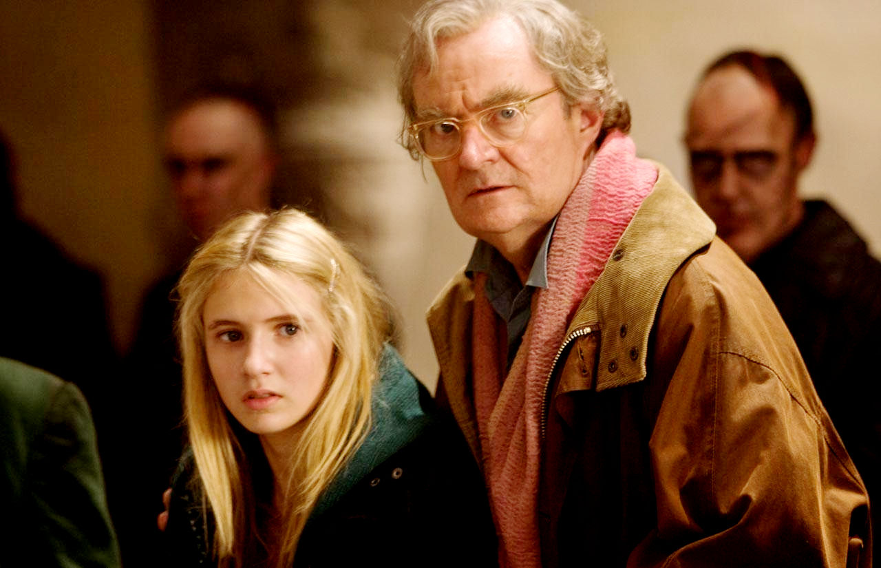 Eliza Bennett stars as Meggie Folchart and Jim Broadbent stars as Fenoglio in New Line Cinema's Inkheart (2009)