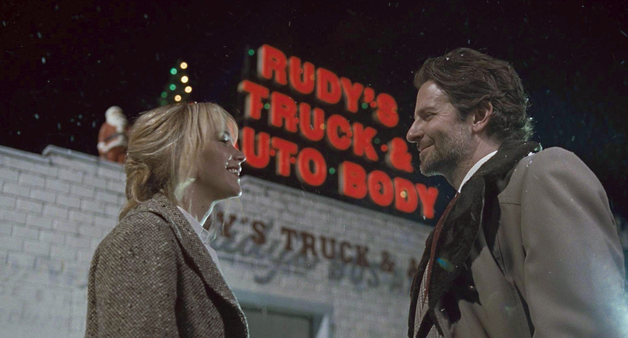 Jennifer Lawrence (stars as Joy) and Bradley Cooper in 20th Century Fox's Joy (2015)