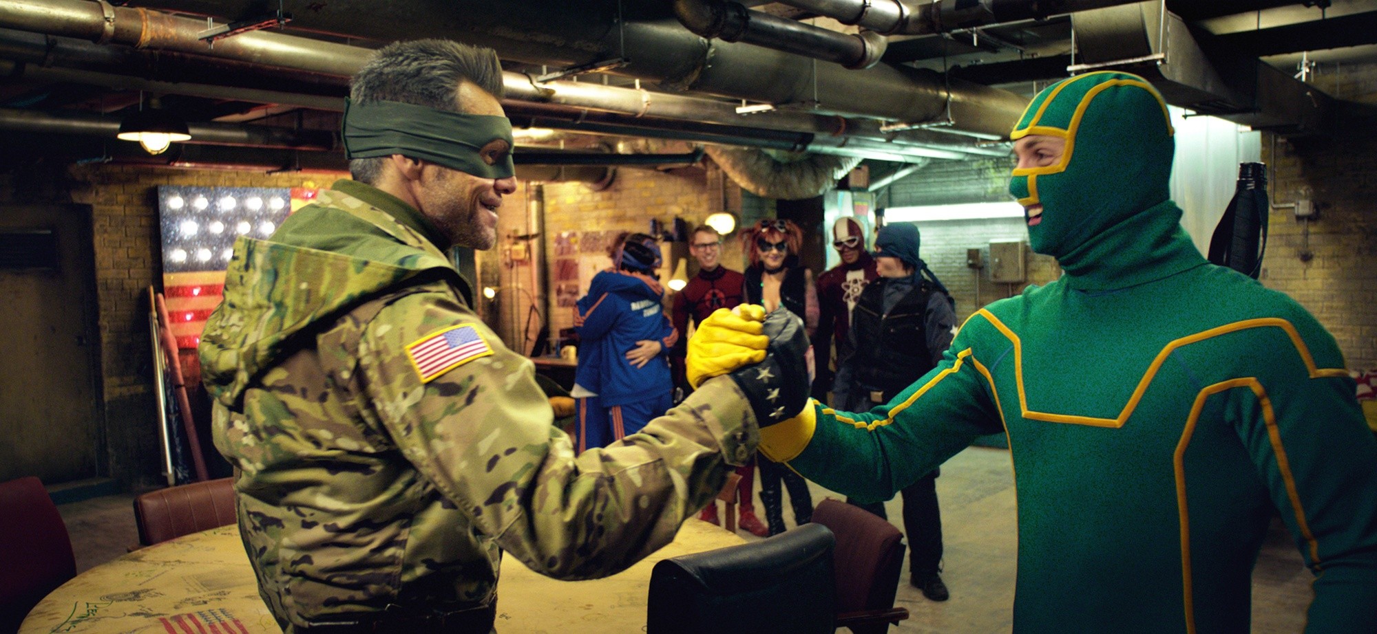 Jim Carrey stars as Colonel Stars and Stripes and Aaron Johnson stars as Dave Lizewski/Kick-Ass in Universal Pictures' Kick-Ass 2 (2013)