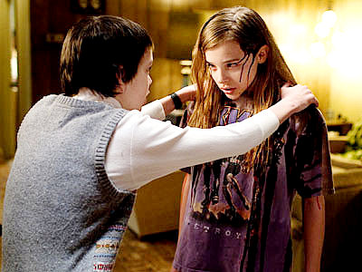 Kodi Smit-McPhee stars as Owen and Chloe Moretz stars as Abby in Overture Films' Let Me In (2010)