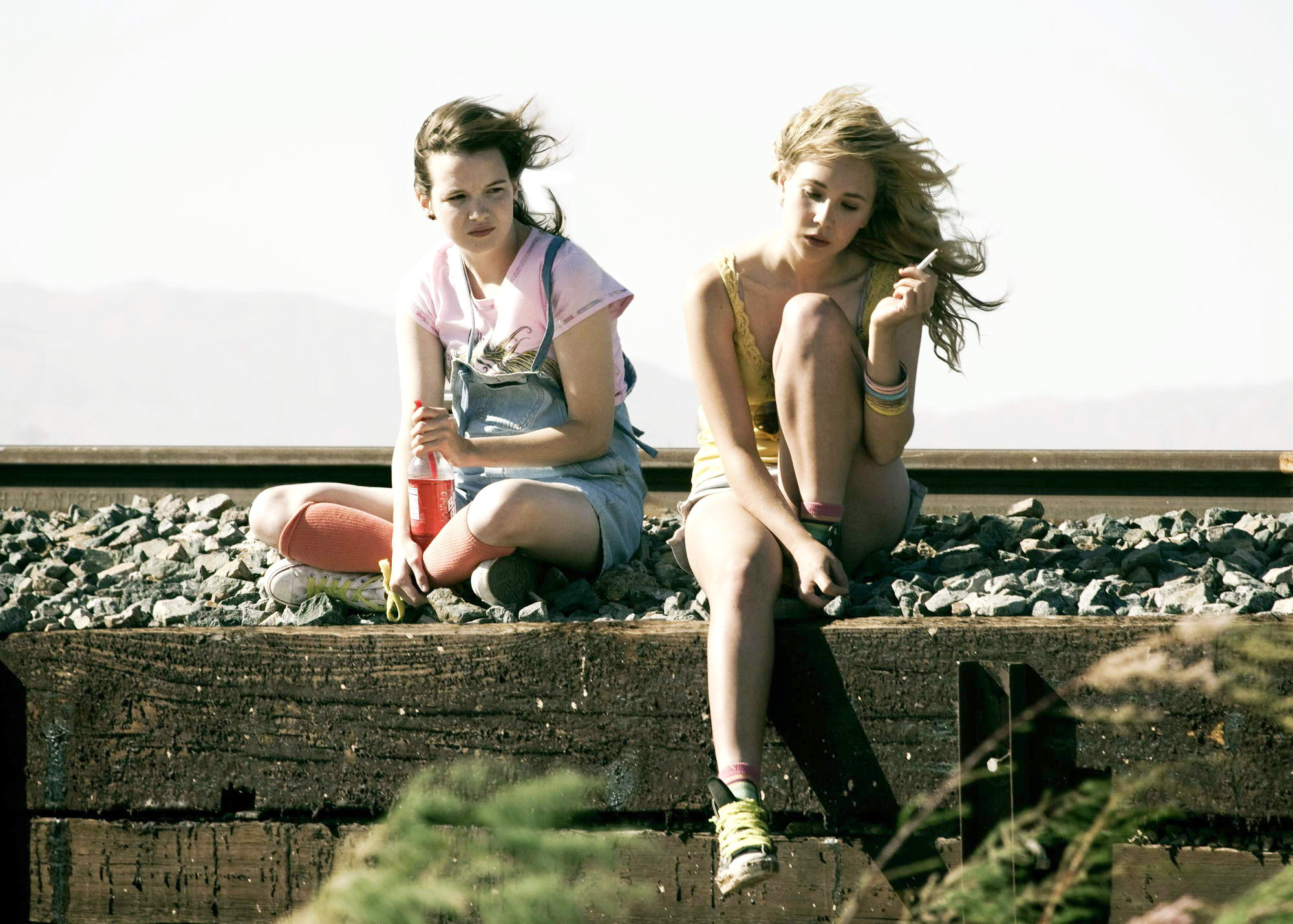 Kay Panabaker stars as Alison and Juno Temple stars as Lily Hobart in Millennium Entertainment's Little Birds (2012)