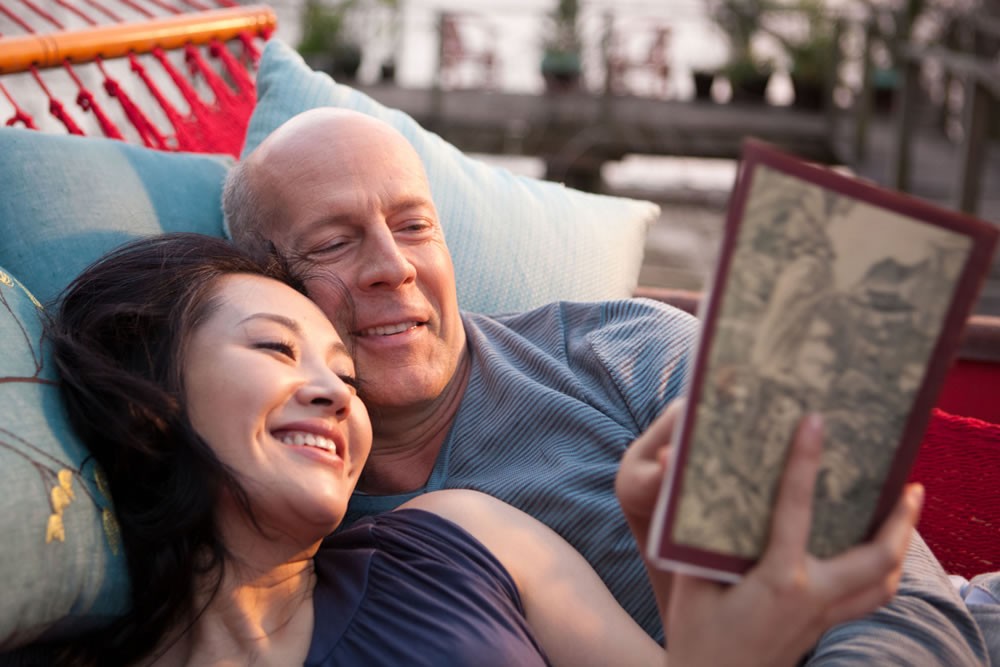 Xu Qing stars as Old Joe's Wife and Bruce Willis stars as Older Joe in TriStar Pictures' Looper (2012)