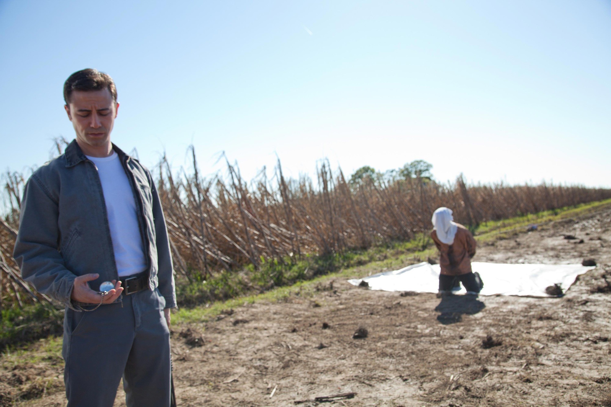 Joseph Gordon-Levitt stars as Joe and Bruce Willis stars as Older Joe in TriStar Pictures' Looper (2012)