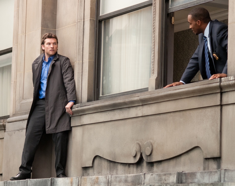 Sam Worthington stars as Nick Cassidy and Anthony Mackie stars as Mike Ackerman in Summit Entertainment's Man on a Ledge (2012)