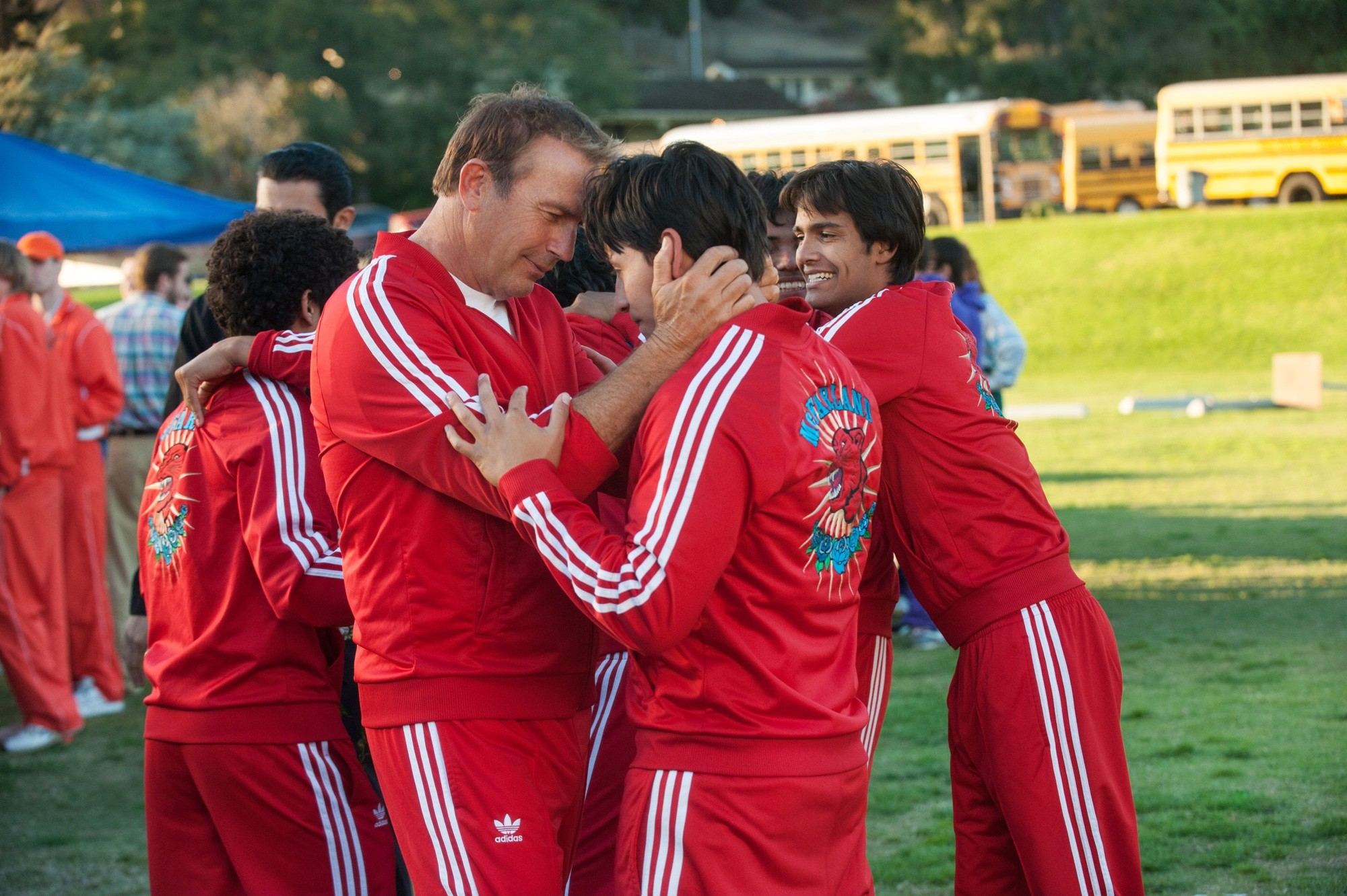 Kevin Costner stars as Jim White and Carlos Pratts stars as Thomas in Walt Disney Pictures' McFarland, USA (2015)