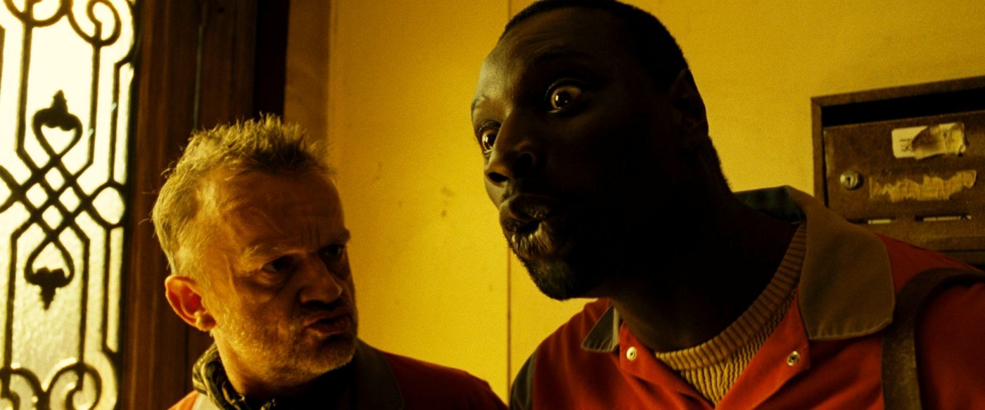 Dominique Pinon stars as Fracasse and Omar Sy stars as Remington Dany Boon stars as Bazil in Sony Pictures Classics' Micmacs (2010)