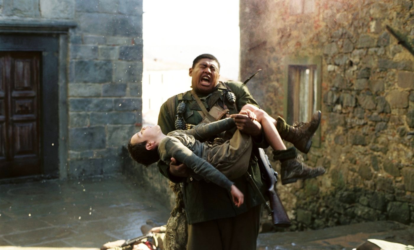 Matteo Sciabordi stars as Angelo Torancelli 'The Boy' and Omar Benson Miller stars as Private First Class Sam Train in Buena Vista Pictures' Miracle at St. Anna (2008)