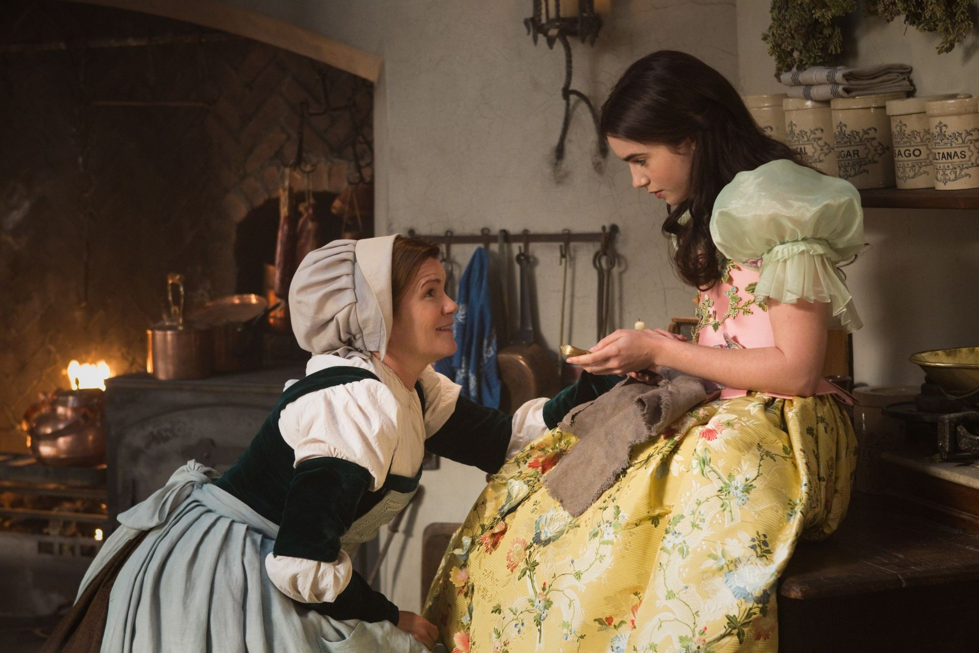Mare Winningham stars as Baker Margaret and Lily Collins stars as Snow White in Relativity Media's Mirror Mirror (2012). Photo credit by Jan Thijs.