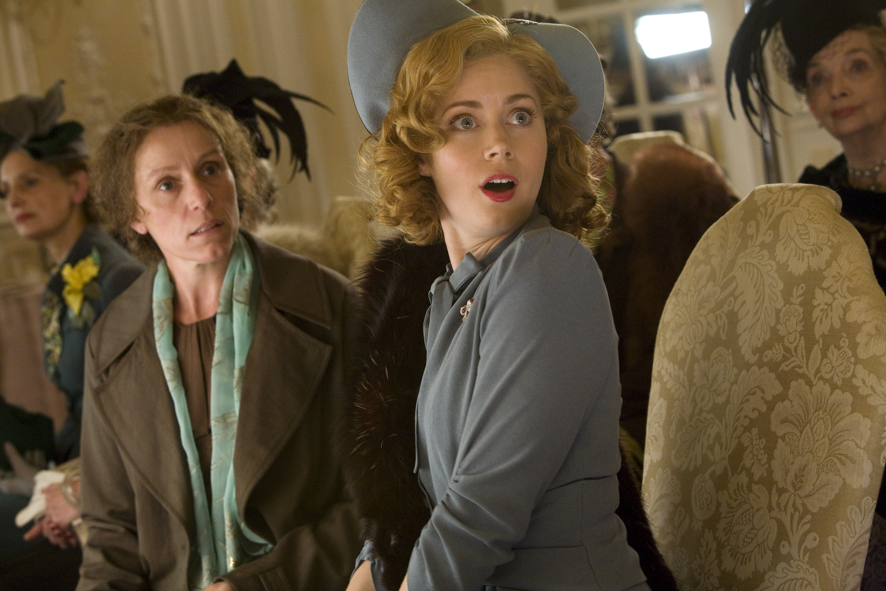 Frances McDormand (left) and Amy Adams (right) star in Bharat Nalluri's MISS PETTIGREW LIVES FOR A DAY, a Focus Features release.