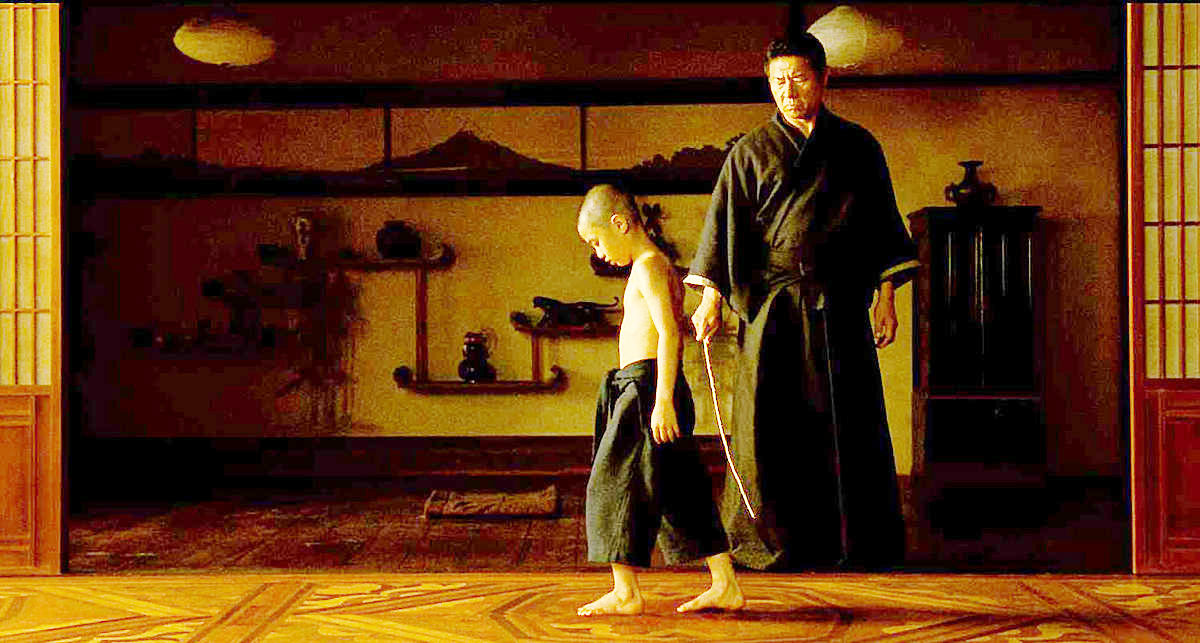 Yoon Sungwoong stars as Young Raizo and Sho Kosugi stars as Ozunu in Warner Bros Pictures' Ninja Assassin (2009)