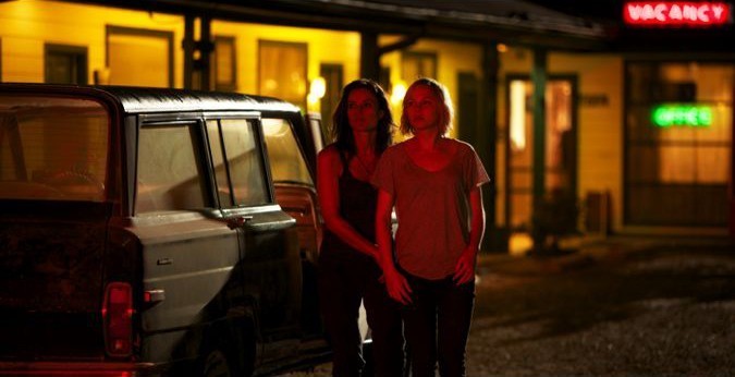 Lindsey Shaw stars as Amber and Adelaide Clemens stars as Emma in Anchor Bay Films' No One Lives (2013)