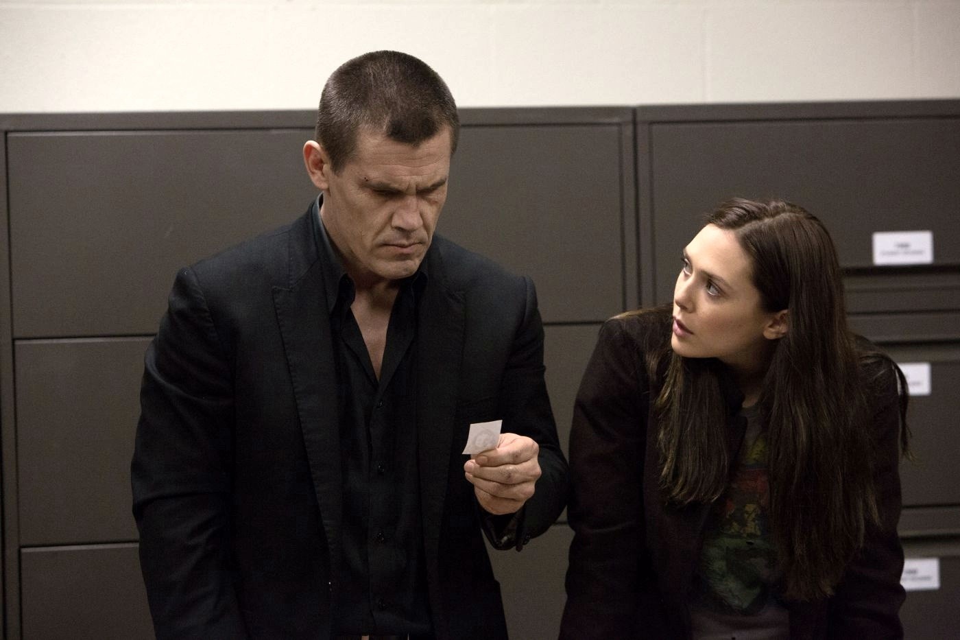 Josh Brolin stars as Joe Doucett and Elizabeth Olsen stars as Marie in FilmDistrict's Oldboy (2013)