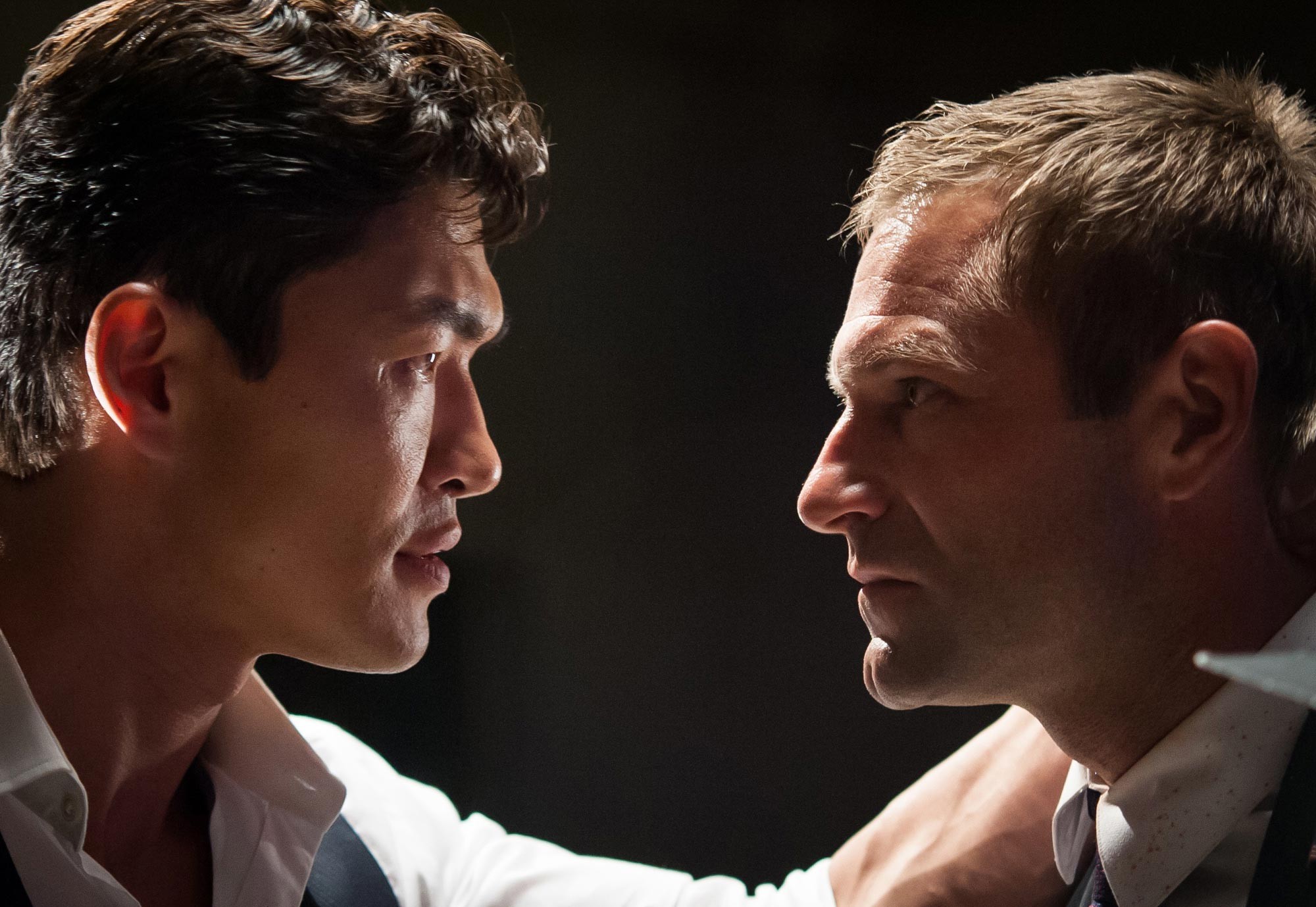 Rick Yune stars as Kang and Aaron Eckhart stars as President Benjamin Asher in FilmDistrict's Olympus Has Fallen (2013)