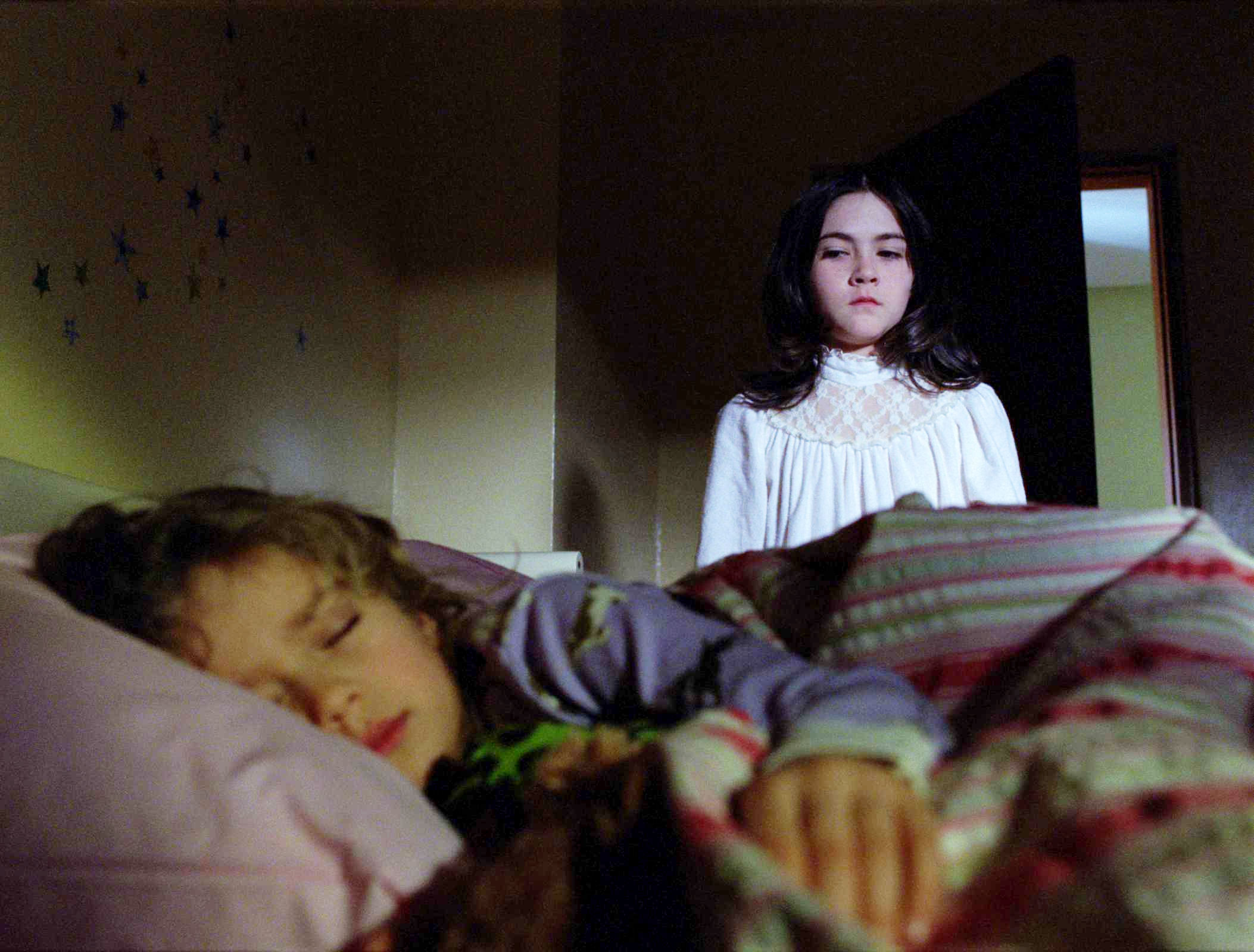Aryana Engineer stars as Max Coleman and Isabelle Fuhrman stars as Esther in Warner Bros. Pictures' Orphan (2009)